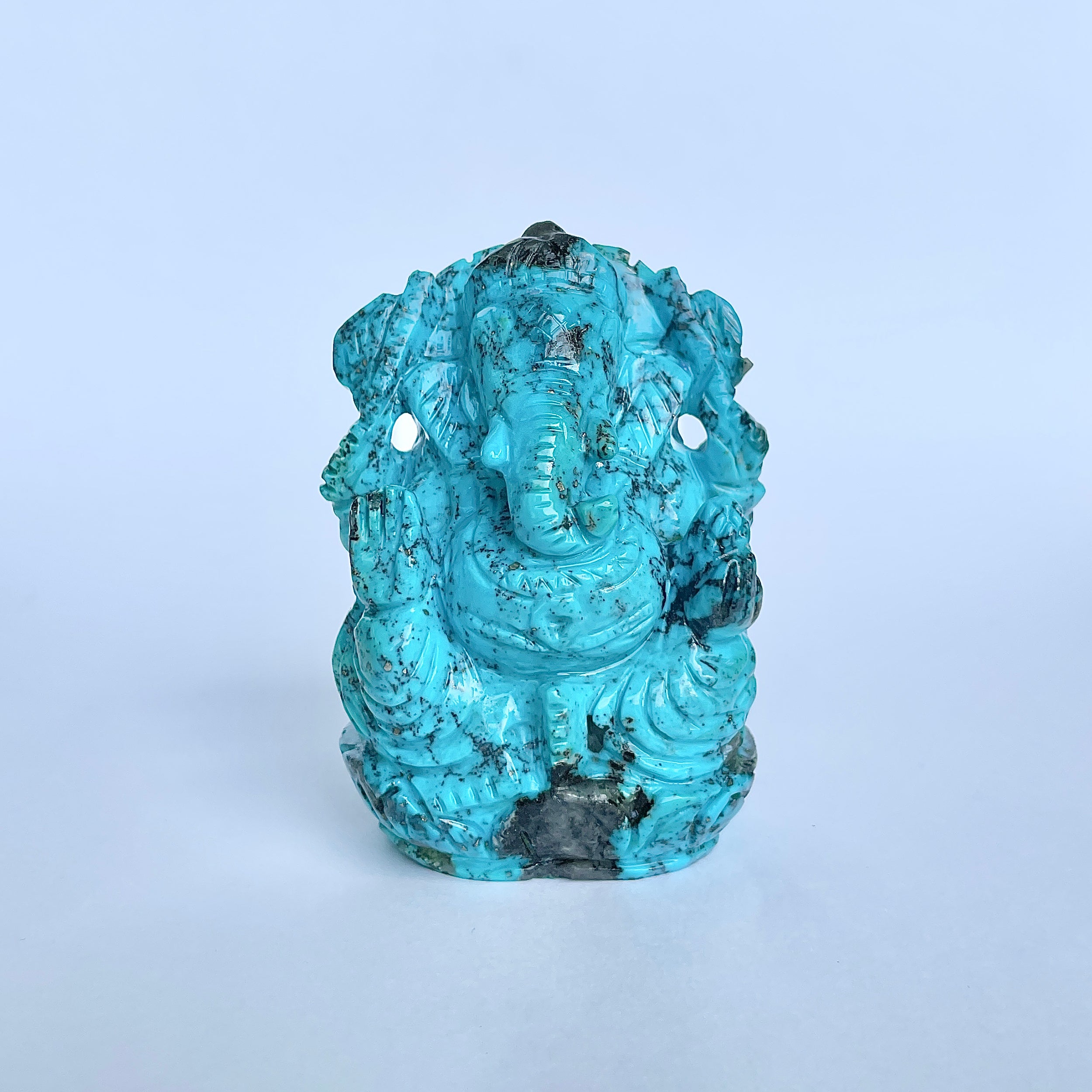 พระพิฆเนศองค์ใหญ่ สีฟ้าเทอร์ควอยซ์ น้ำหนัก 1,025 กะรัต สูง 7.8 ซม.(TRQ-MRT-1.)