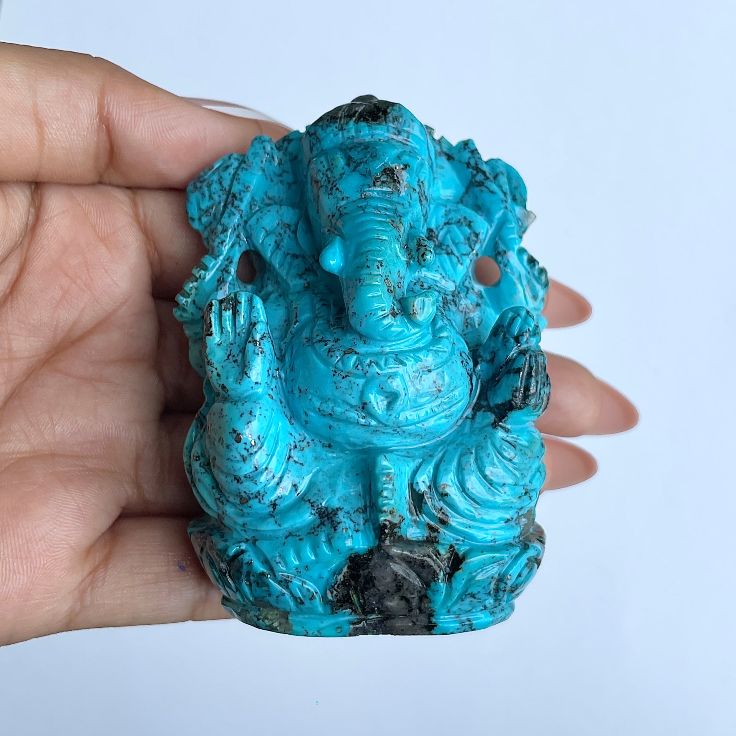 พระพิฆเนศองค์ใหญ่ สีฟ้าเทอร์ควอยซ์ น้ำหนัก 1,025 กะรัต สูง 7.8 ซม.(TRQ-MRT-1.)