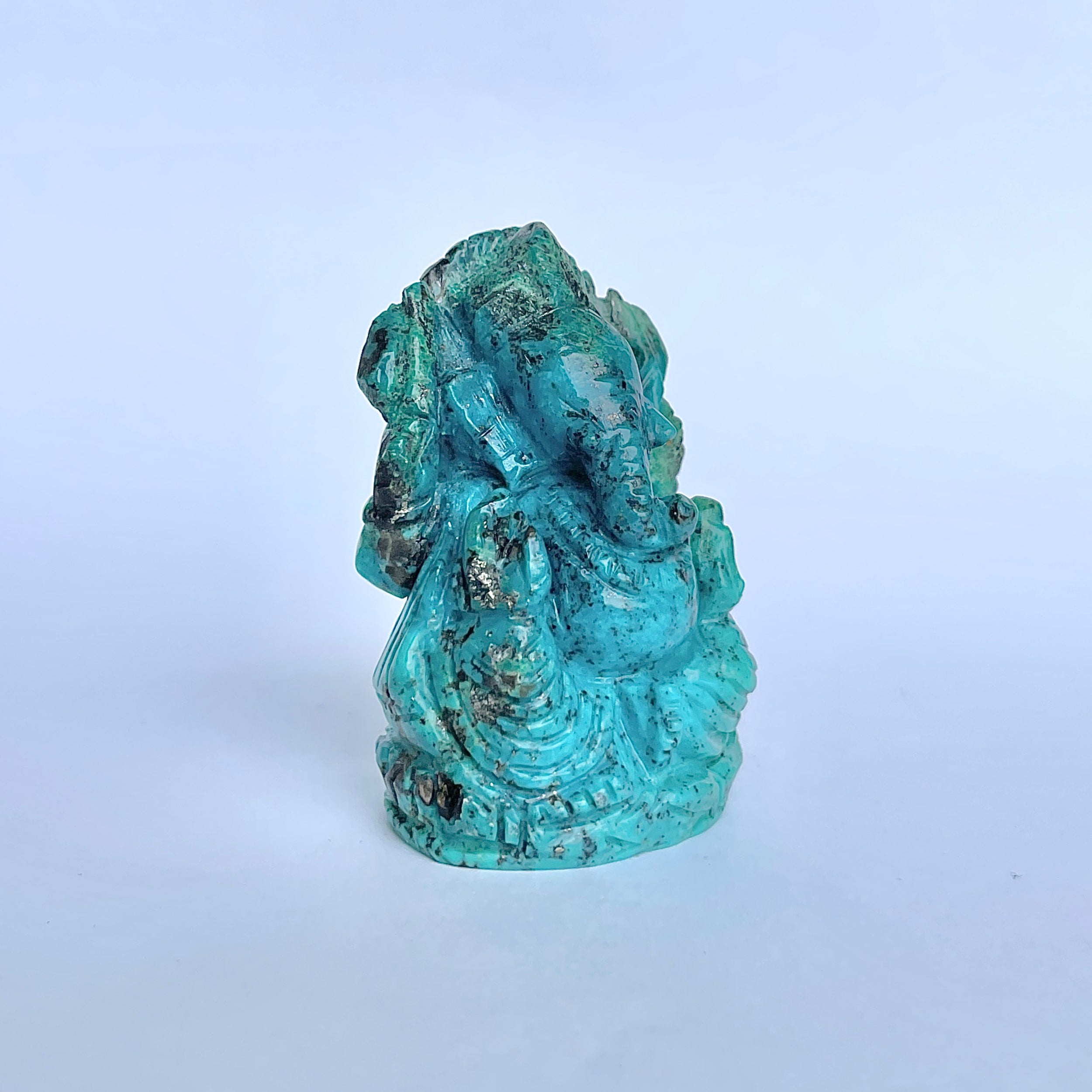 พระพิฆเนศองค์ใหญ่ สีฟ้าเทอร์ควอยซ์ น้ำหนัก 475 กะรัต สูง 5.5 ซม.(TRQ-MRT-10.)