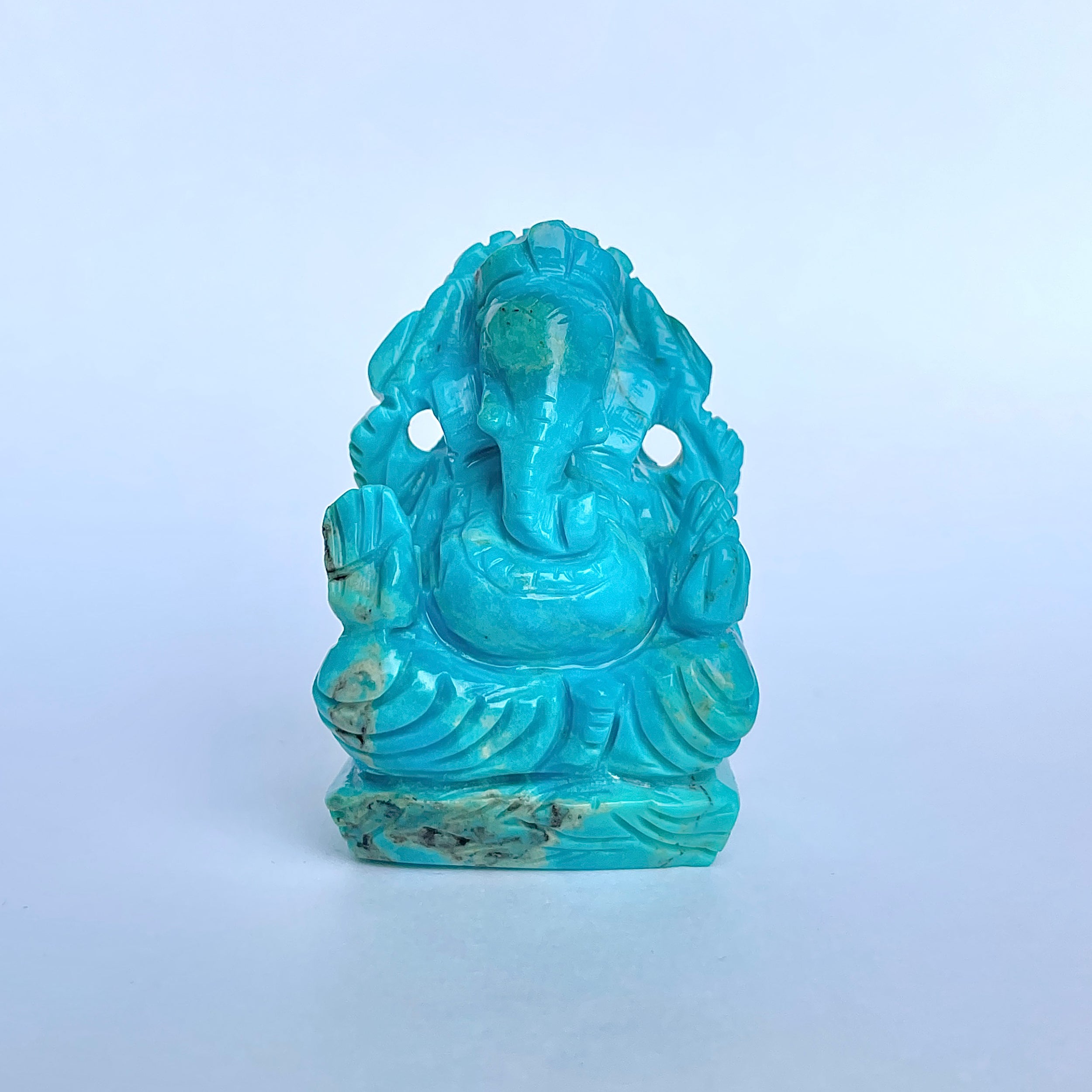 พระพิฆเนศองค์ใหญ่ สีฟ้าเทอร์ควอยซ์ น้ำหนัก 420 กะรัต สูง 5.9 ซม.(TRQ-MRT-11.)