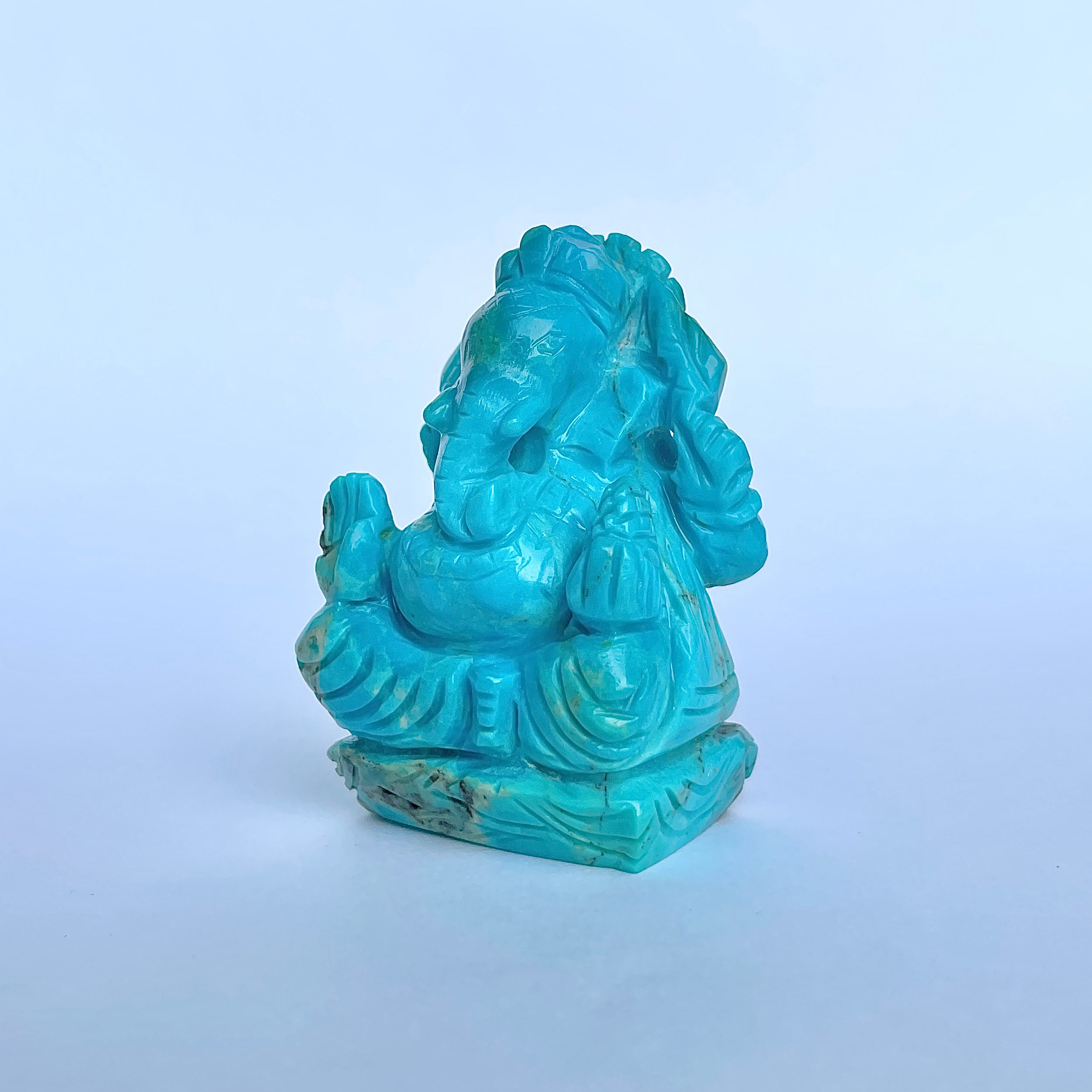 พระพิฆเนศองค์ใหญ่ สีฟ้าเทอร์ควอยซ์ น้ำหนัก 420 กะรัต สูง 5.9 ซม.(TRQ-MRT-11.)
