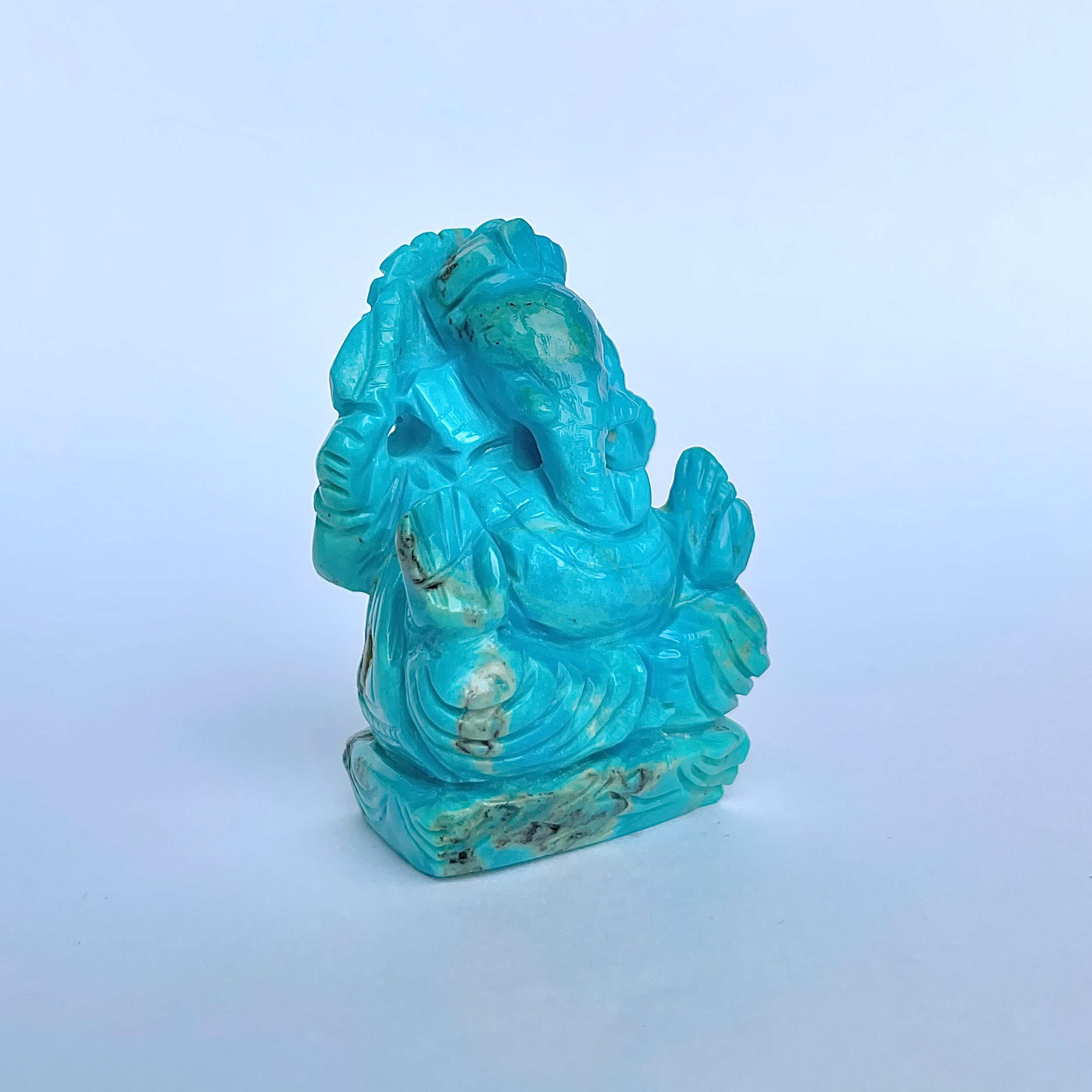 พระพิฆเนศองค์ใหญ่ สีฟ้าเทอร์ควอยซ์ น้ำหนัก 420 กะรัต สูง 5.9 ซม.(TRQ-MRT-11.)