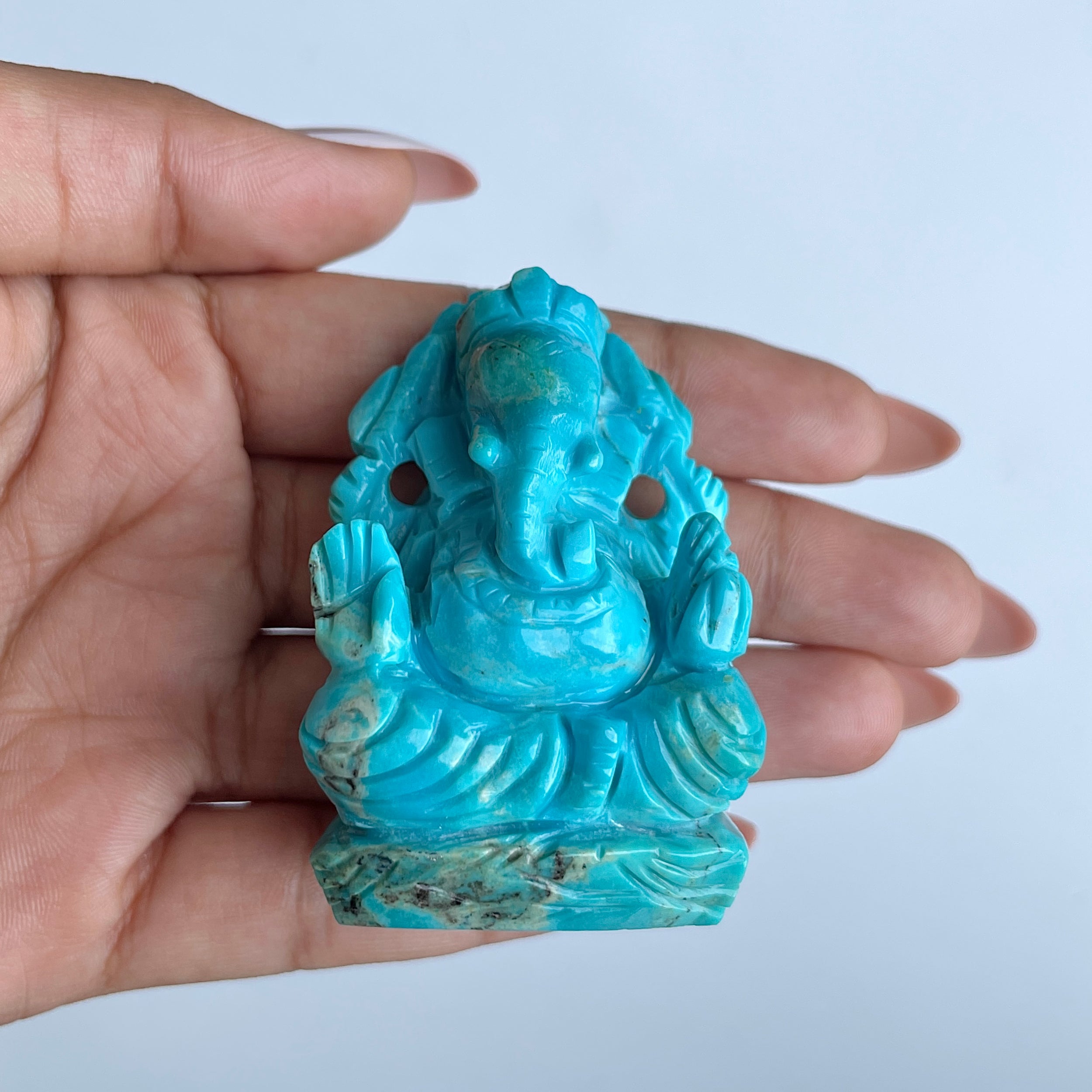 พระพิฆเนศองค์ใหญ่ สีฟ้าเทอร์ควอยซ์ น้ำหนัก 420 กะรัต สูง 5.9 ซม.(TRQ-MRT-11.)