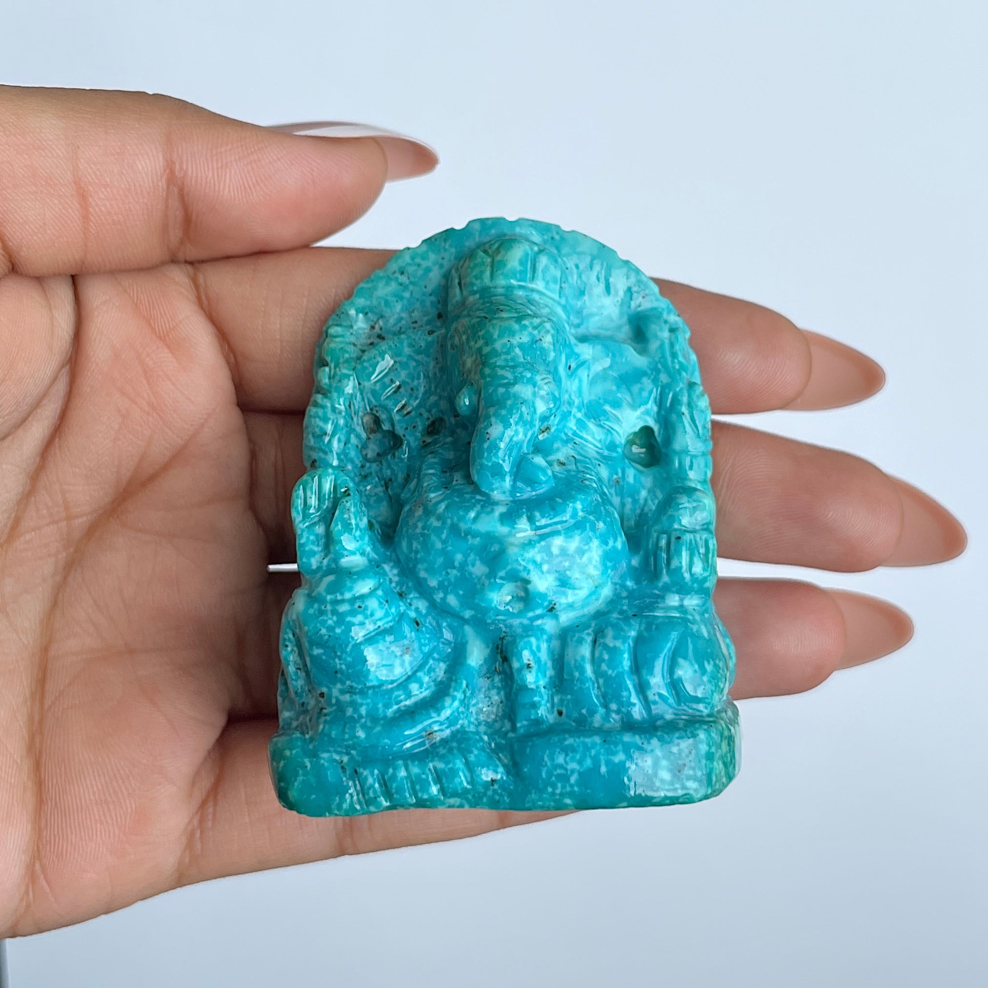 พระพิฆเนศองค์ใหญ่ สีฟ้าเทอร์ควอยซ์ น้ำหนัก 585 กะรัต สูง 6 ซม.(TRQ-MRT-7.)