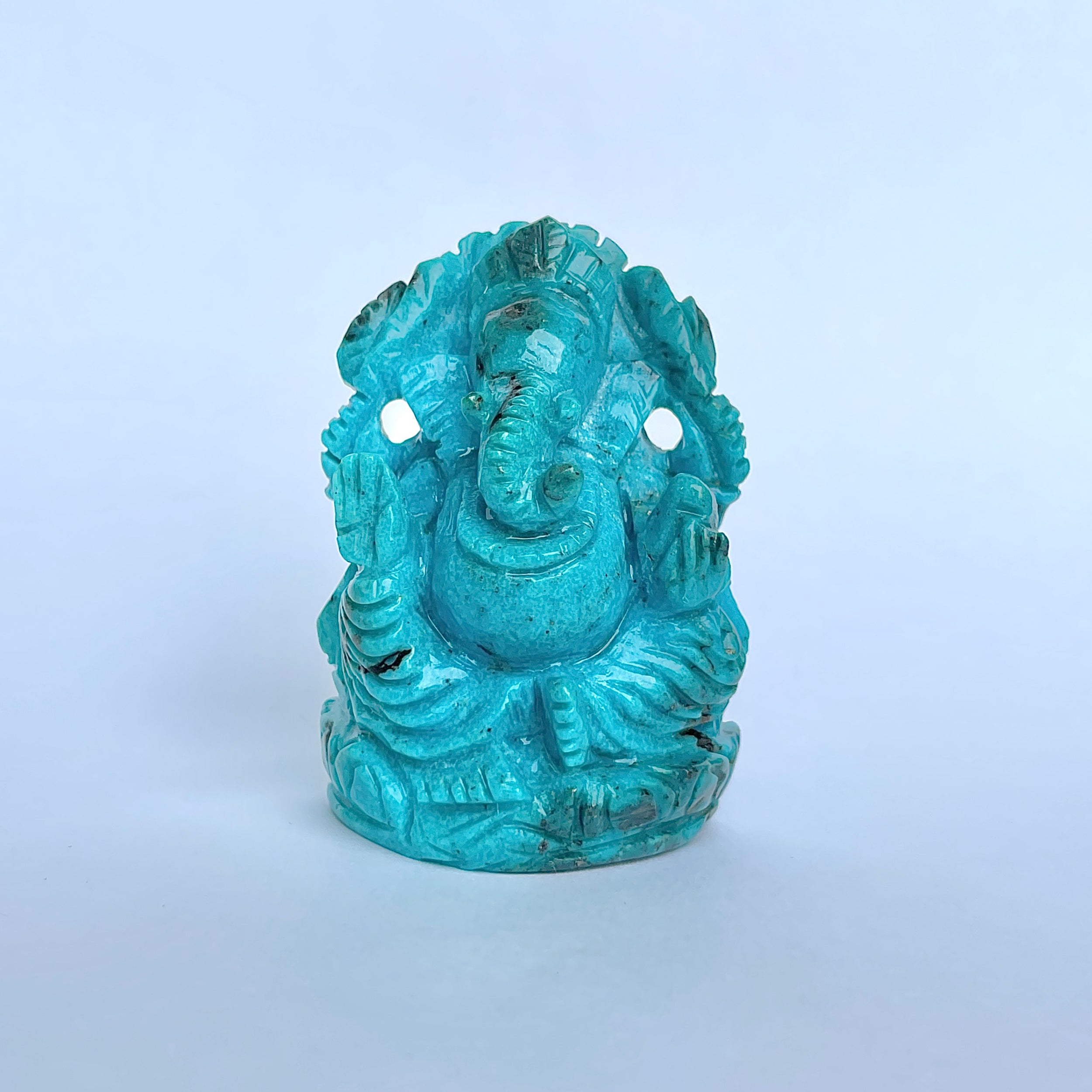 พระพิฆเนศองค์ใหญ่ สีฟ้าเทอร์ควอยซ์ น้ำหนัก 470 กะรัต สูง 6.2 ซม.(TRQ-MRT-9.)