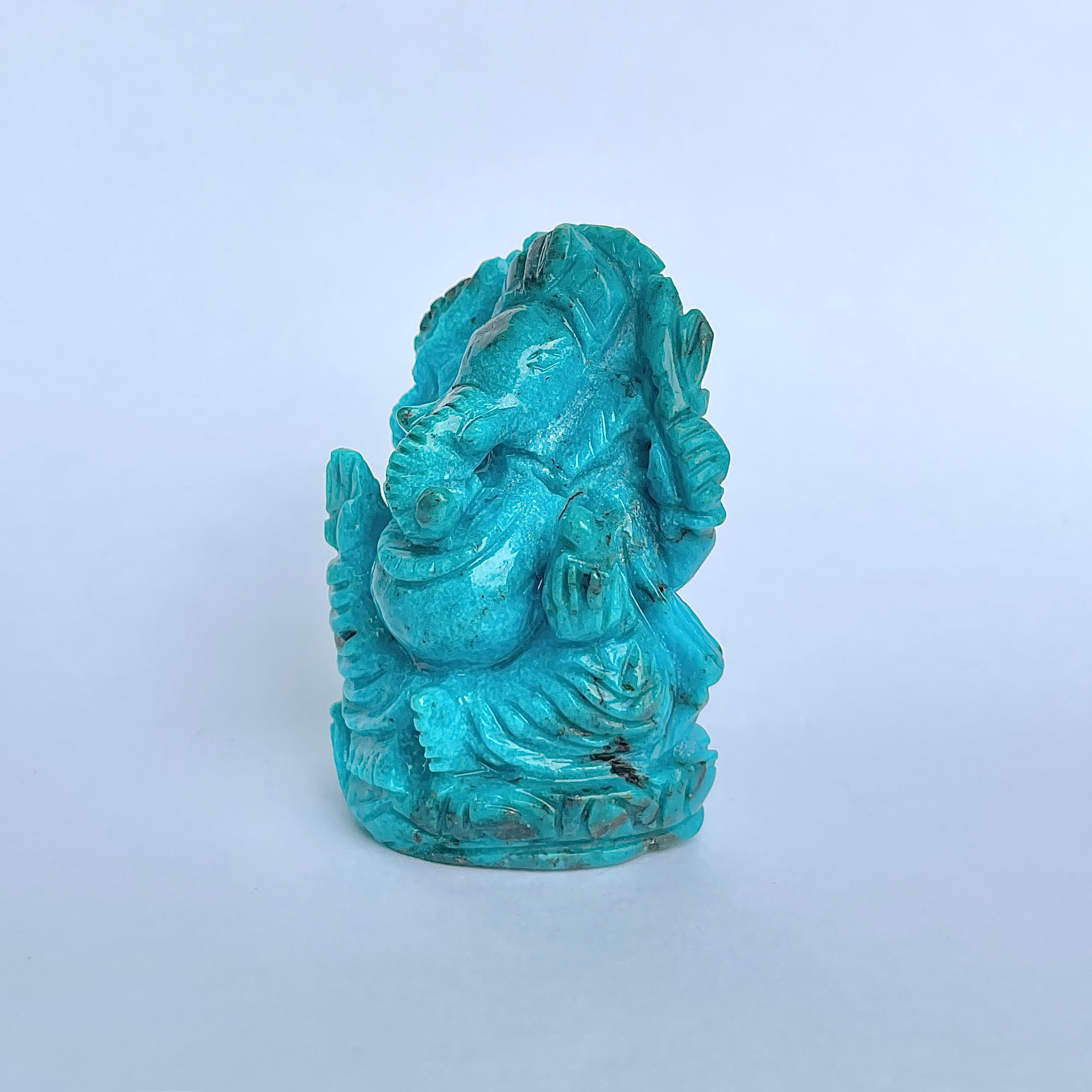 พระพิฆเนศองค์ใหญ่ สีฟ้าเทอร์ควอยซ์ น้ำหนัก 470 กะรัต สูง 6.2 ซม.(TRQ-MRT-9.)