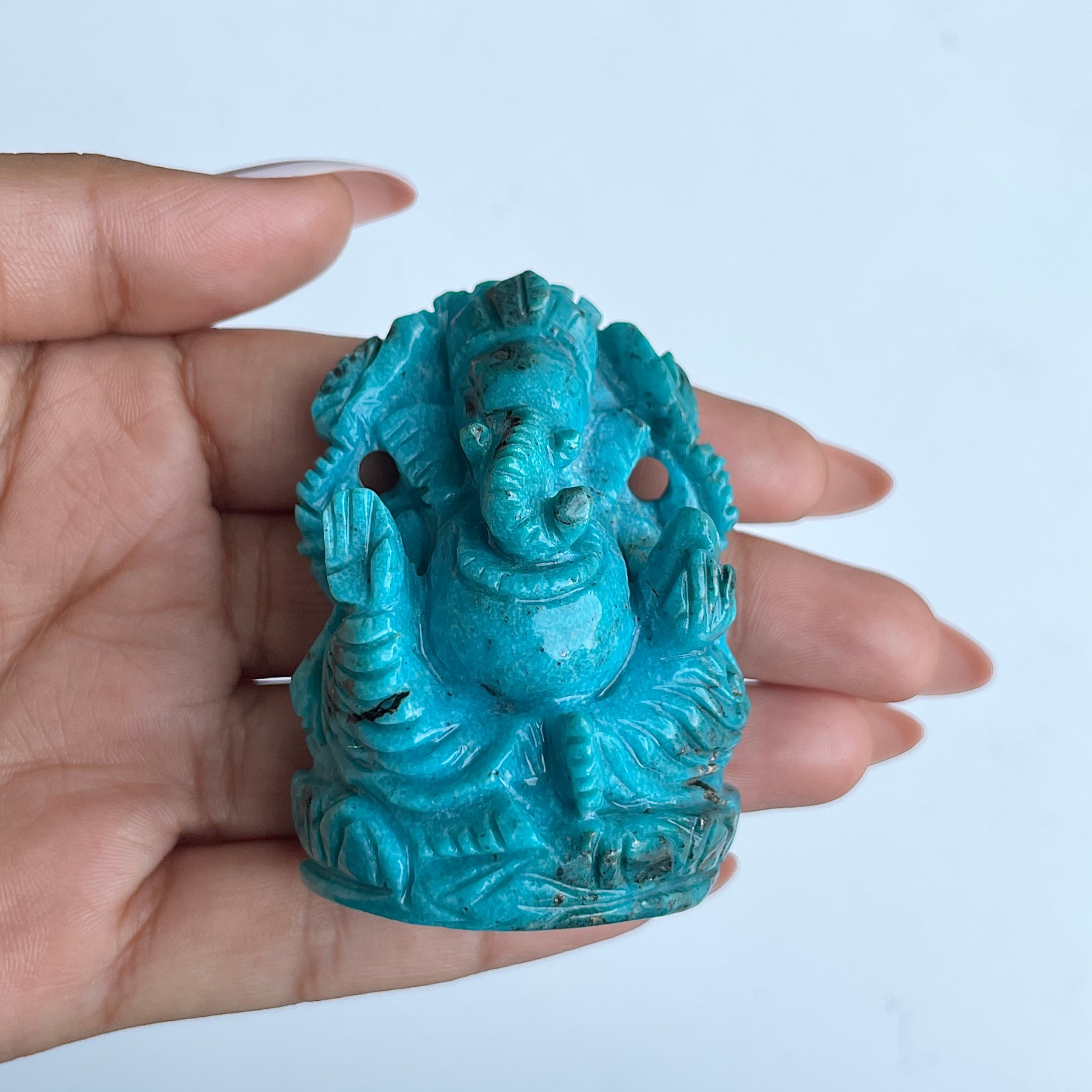 พระพิฆเนศองค์ใหญ่ สีฟ้าเทอร์ควอยซ์ น้ำหนัก 470 กะรัต สูง 6.2 ซม.(TRQ-MRT-9.)